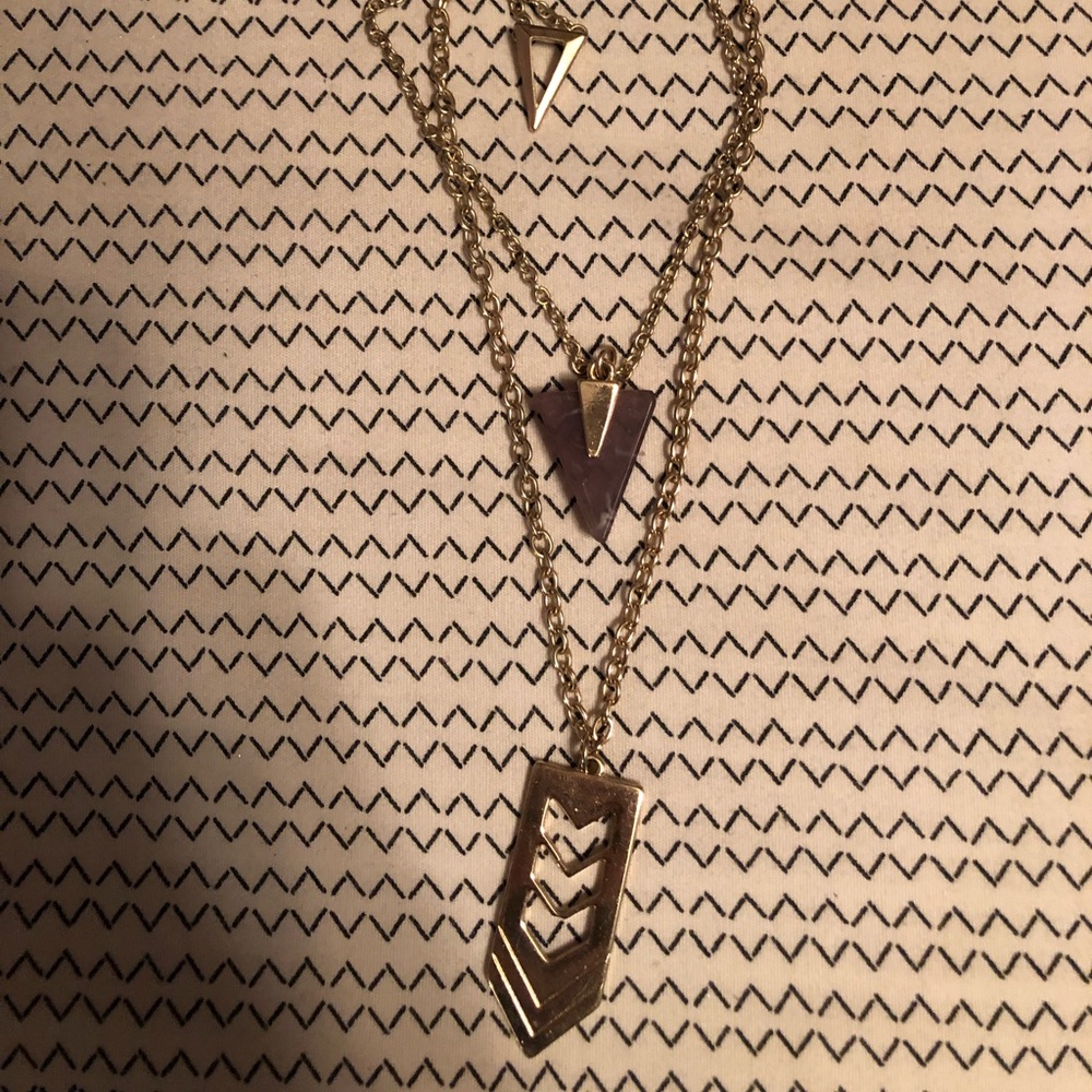 gold layered necklace with amethyst charm